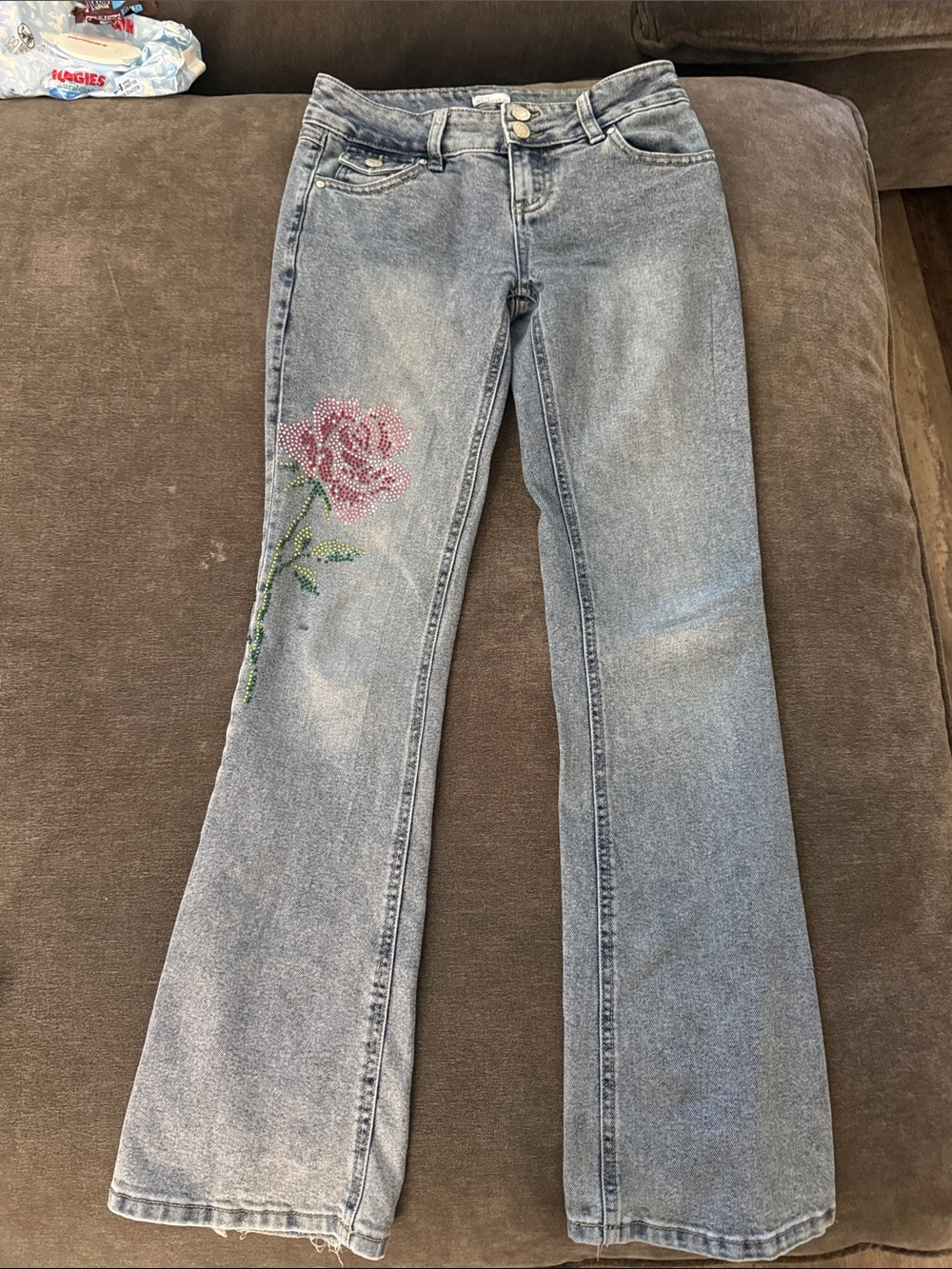 Light Wash Flare Jeans with Pink Rose Crystal Detail
